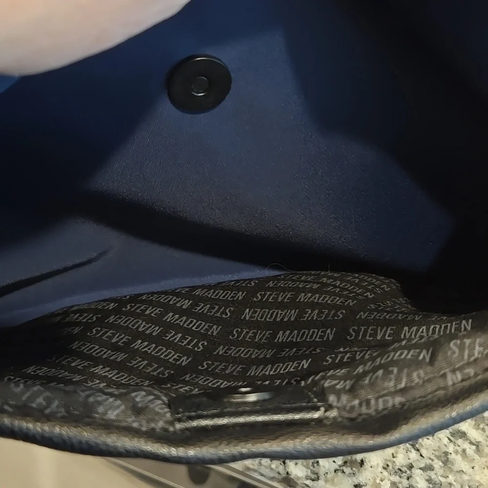STEVE MADDEN BACKPACK WITH INCLUDED FRONT QUILTED POUCH FOR A TABLET. BLUE/GREY.